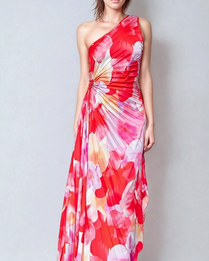 Full front view of a women's red and pink floral print one-shoulder maxi dress with elegant pleated details.