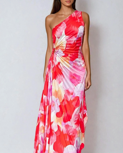 Full-length view of women's floral print one-shoulder maxi dress, featuring a vibrant red and pink pattern.