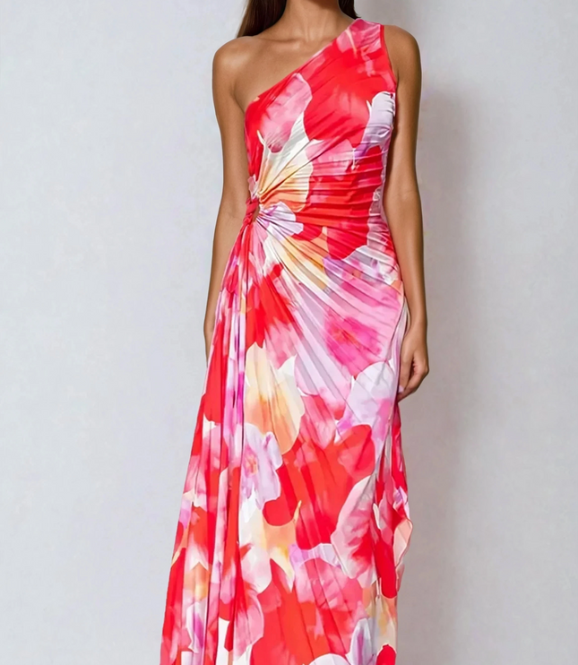 Full-length view of women's floral print one-shoulder maxi dress, featuring a vibrant red and pink pattern.