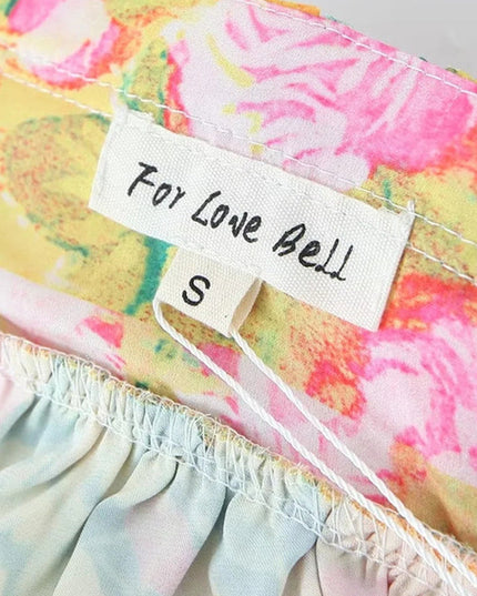 Product tag on the floral print tie shoulder mini dress, showing 'For Love Bell' brand and size 'S'.