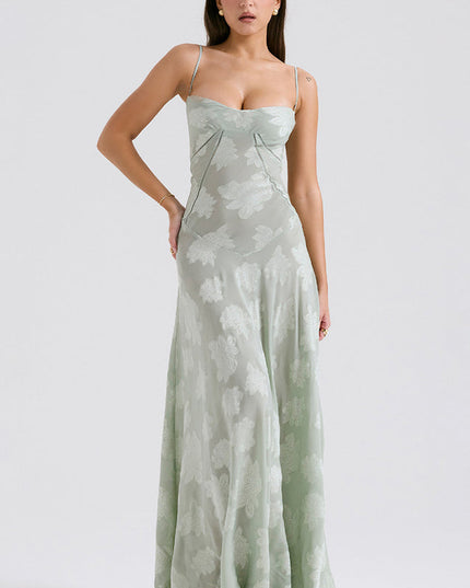 Full-length view of a women's floral printed sweetheart neck maxi dress in a soft sage green, with spaghetti straps.