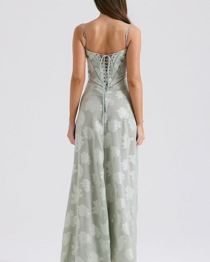 Back view of women's sage green floral printed maxi dress, showcasing the full lace-up corset design.