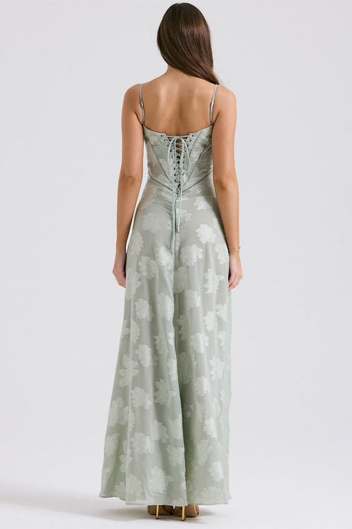 Back view of women's sage green floral printed maxi dress, showcasing the full lace-up corset design.
