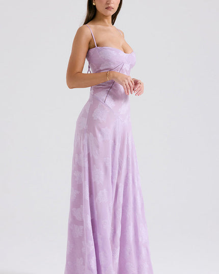 Side profile of the women's lavender floral maxi dress, highlighting the fitted bodice and long, elegant silhouette.