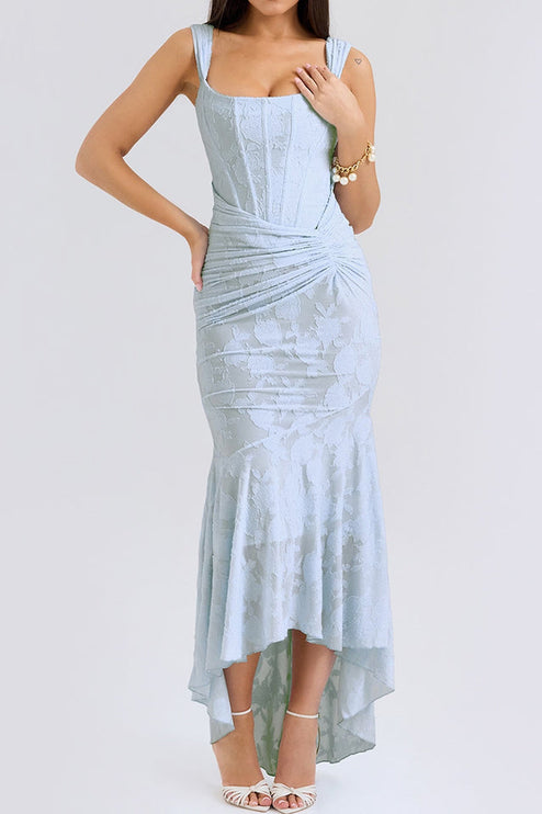 Front view of a women's light blue floral ruched maxi dress with a square neckline, corset-style bodice, and high-low hem.