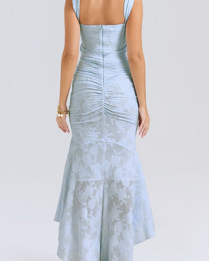 Rear view of the women's light blue floral ruched maxi dress, displaying the intricate ruched back and high-low hem.