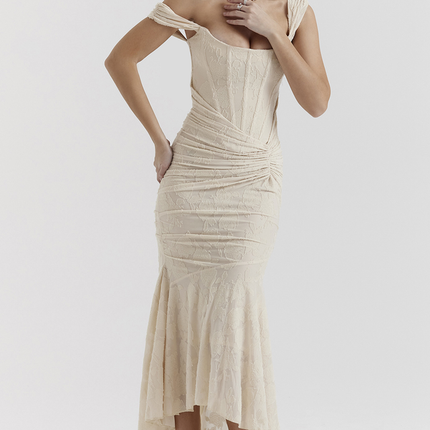 Cream floral ruched off-shoulder maxi dress with a corset bodice and high-low hem, shown from the front.
