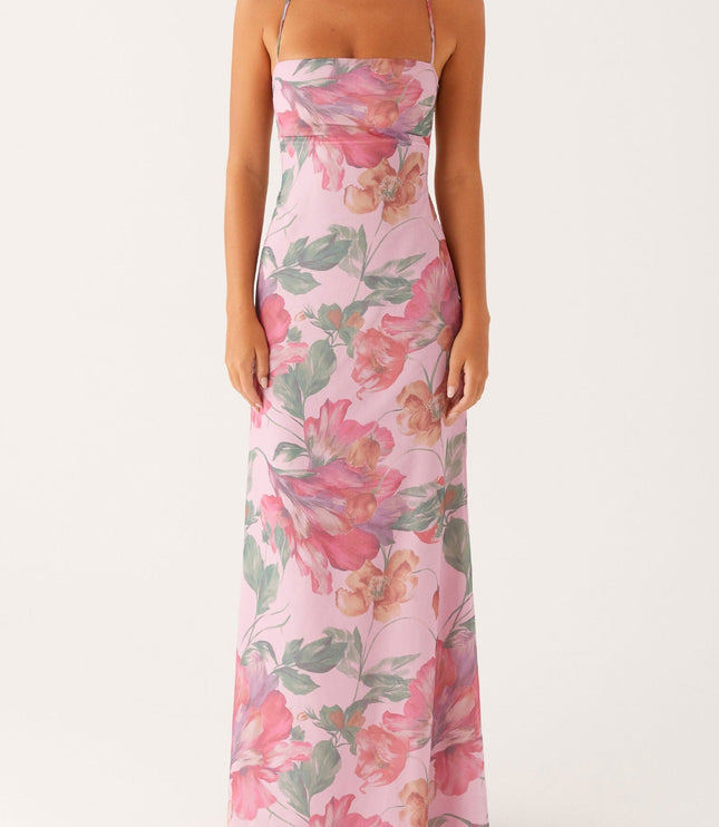 Full front view of a women's pink floral square neck maxi dress, highlighting the vibrant pattern.