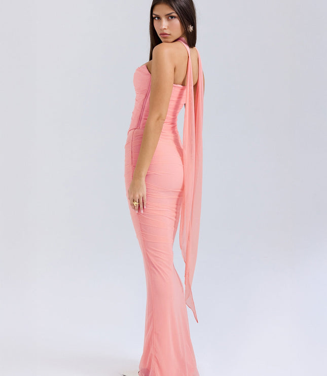 Back-side view of the light pink strapless ruched maxi dress, showcasing the long sheer fabric flowing from the choker.