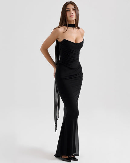 Black strapless ruched maxi dress, three-quarter back view, highlighting the elegant drape.