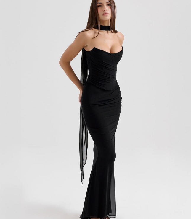 Black strapless ruched maxi dress, three-quarter back view, highlighting the elegant drape.