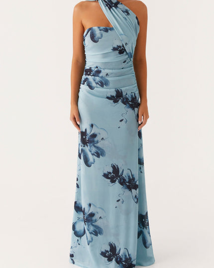 Front view of women's light blue floral maxi dress, featuring a strapless ruched bodice and a flowing skirt with dark blue flowers.