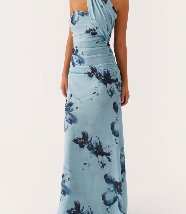Elegant light blue floral strapless ruched maxi dress with a unique draped neckline, showcasing the dark blue flower design.
