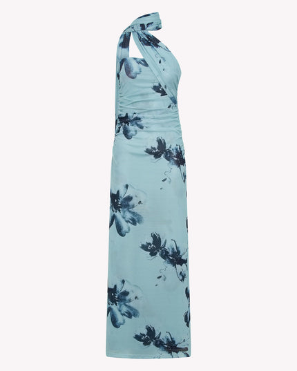 Side view of the light blue floral strapless ruched maxi dress, showcasing the full length and dark blue flower pattern.