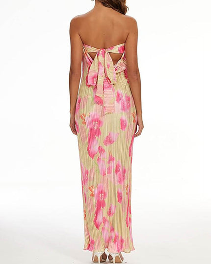 Rear full view of the women's floral strapless tie-back pleated maxi dress, showcasing the elegant bow detail.