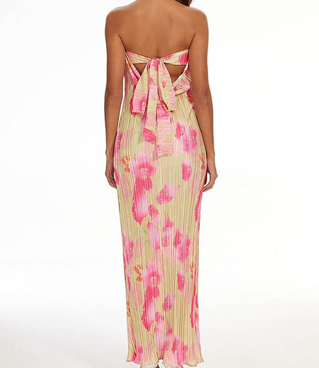 Rear full view of the women's floral strapless tie-back pleated maxi dress, showcasing the elegant bow detail.
