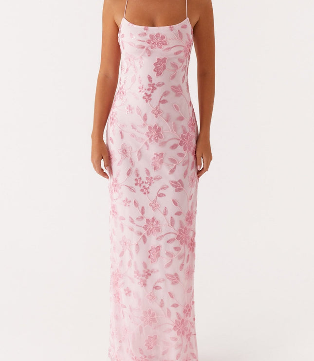 Full front view of the light pink floral maxi dress, showcasing the intricate beading and straight neckline.