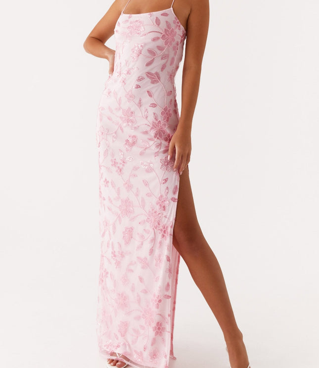 Front view of the pink floral maxi dress with a high side slit, showcasing the full length and beading details.