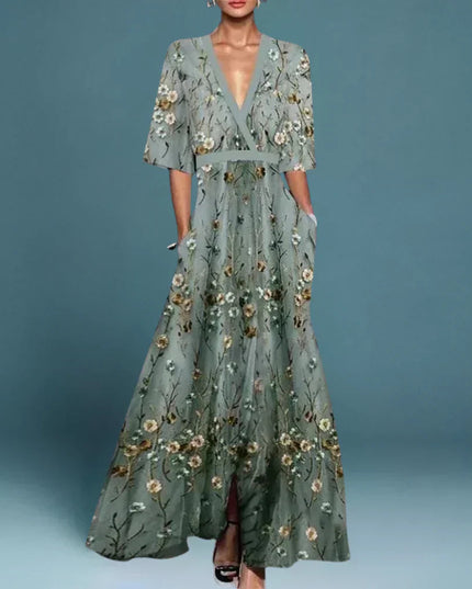 Women's gray floral v-neck maxi dress with short sleeves and pockets, featuring an embroidered floral pattern.