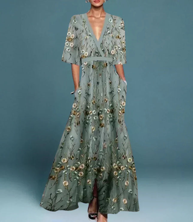 Women's gray floral v-neck maxi dress with short sleeves and pockets, featuring an embroidered floral pattern.