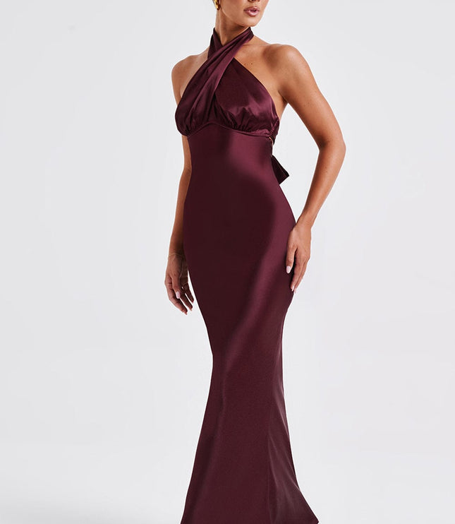 Front view of a women's formal halter neck maxi dress in deep burgundy, with gathered bust detail and a sleek fit.