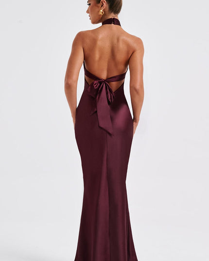 Full back view of the women's formal burgundy maxi dress, showing the low back and tie closure clearly.