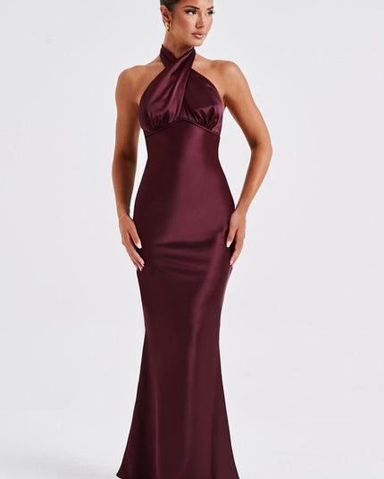 Frontal full-length view of a women's burgundy formal halter neck dress, for special occasions.