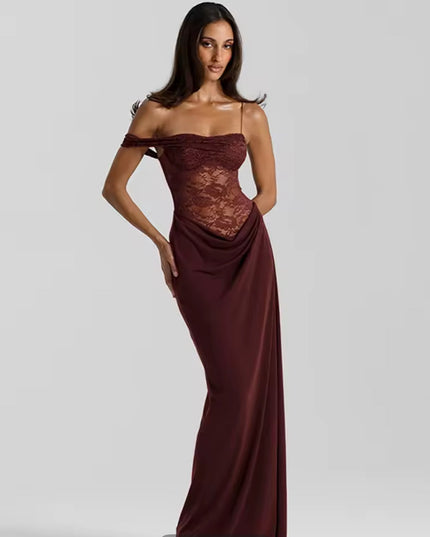 Front view of a woman posing in a deep red off-shoulder lace corset maxi dress with elegant draping.