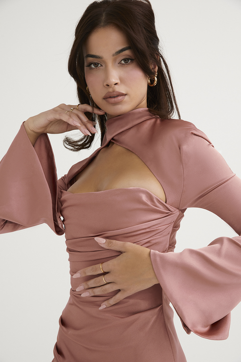 Close-up of the dusty rose halter cut out mini dress, showing the intricate ruching and high neck detail.