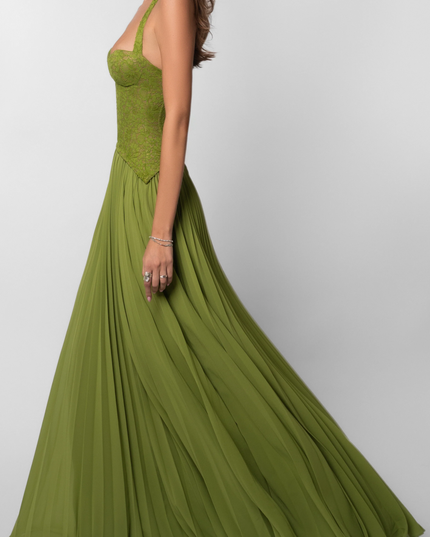 Dynamic side view of the olive green pleated maxi dress, capturing the flow and texture of the fabric as if in motion.