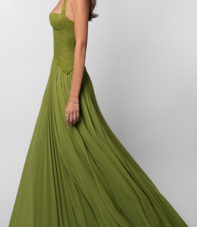 Dynamic side view of the olive green pleated maxi dress, capturing the flow and texture of the fabric as if in motion.