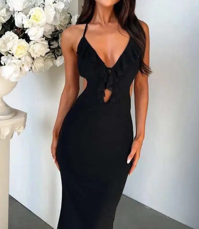 Front view of a black halter ruffle cut out backless maxi dress, with a deep V-neck and subtle side cutouts.