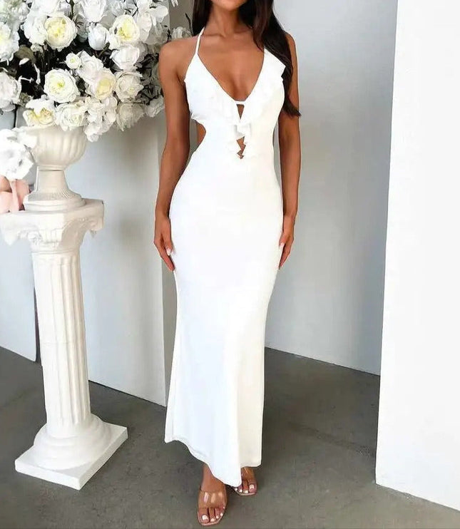 Front view of a white halter ruffle cut out backless maxi dress, featuring a deep V-neck and mermaid silhouette.