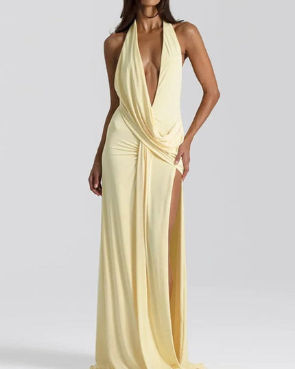 Pale yellow halter v-neck maxi dress featuring a draped front and a high thigh slit, for women.