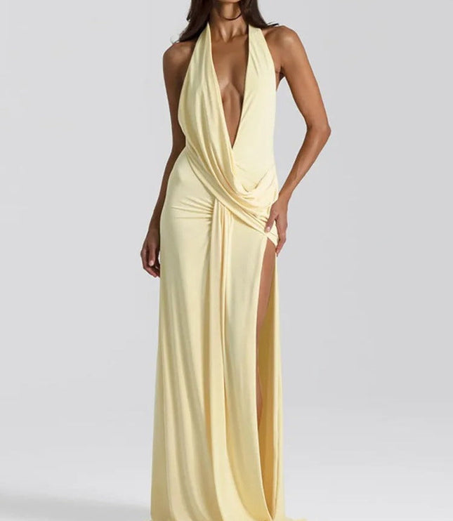 Pale yellow halter v-neck maxi dress featuring a draped front and a high thigh slit, for women.