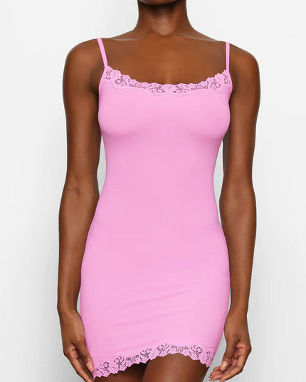 Close-up front view of the pink lace trim mini slip dress, focusing on the intricate lace along the neckline and hem.