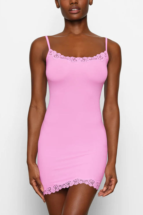 Close-up front view of the pink lace trim mini slip dress, focusing on the intricate lace along the neckline and hem.