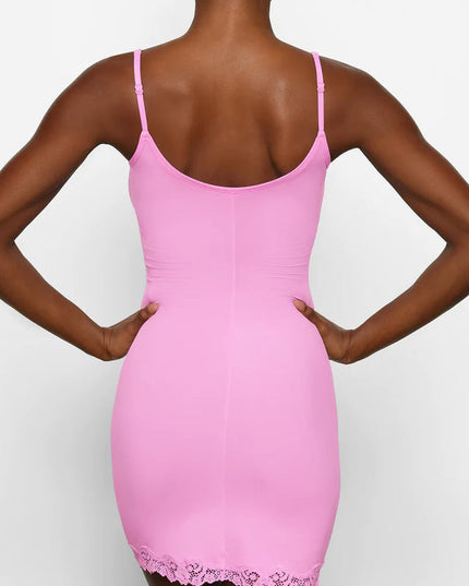 Rear close-up of the pink lace trim mini slip dress, emphasizing the scoop back design and lace hem detail.