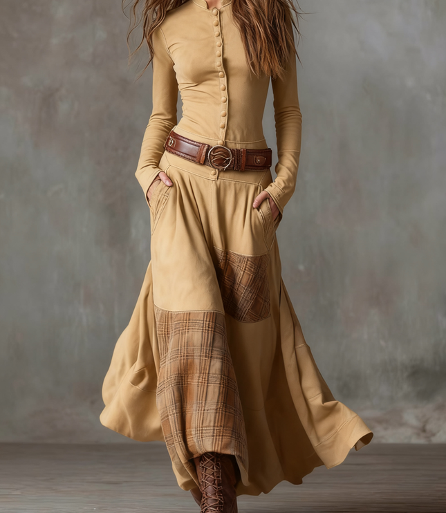 Women's long sleeve button down maxi dress in tan, featuring a plaid panel skirt and brown belt.