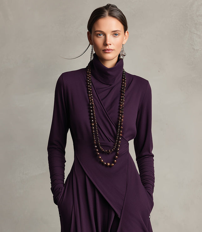 Close-up of the high neck and draped bodice details on the plum long sleeve midi dress with pockets.