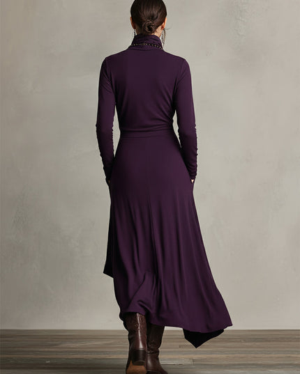 Back view of the women's plum long sleeve draped high neck midi dress, highlighting the flowing skirt.