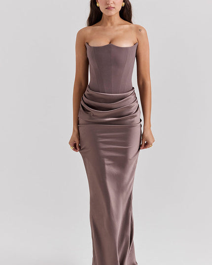 Elegant taupe off-shoulder bustier maxi dress for women, showcasing the draped waist and flowing skirt.