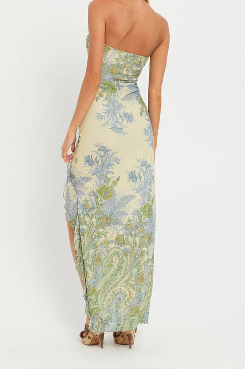 Back view of the women's paisley print bandeau high slit maxi dress, showing the flowing skirt and elegant pattern.