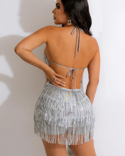 Back view of the silver fringe halter neck mini two-piece set, showcasing the open back and tie details.