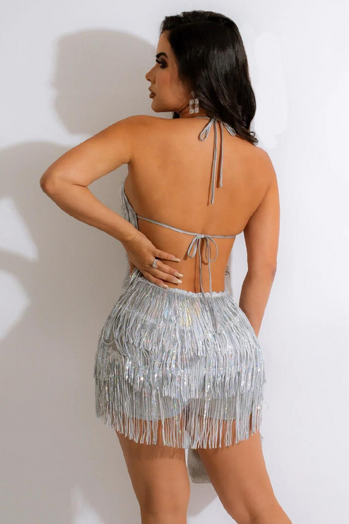 Back view of the silver fringe halter neck mini two-piece set, showcasing the open back and tie details.