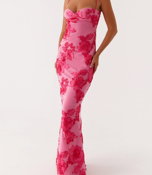 Full body view of women's pink floral sweetheart neck maxi dress, hands on hips, showcasing the elegant silhouette.