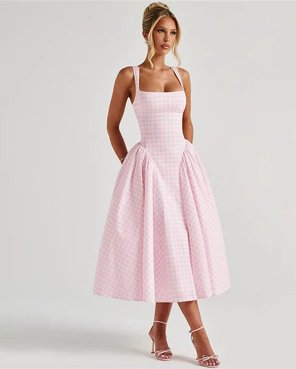 Side profile of women's pink gingham square neck midi dress, showing full skirt and fitted bodice