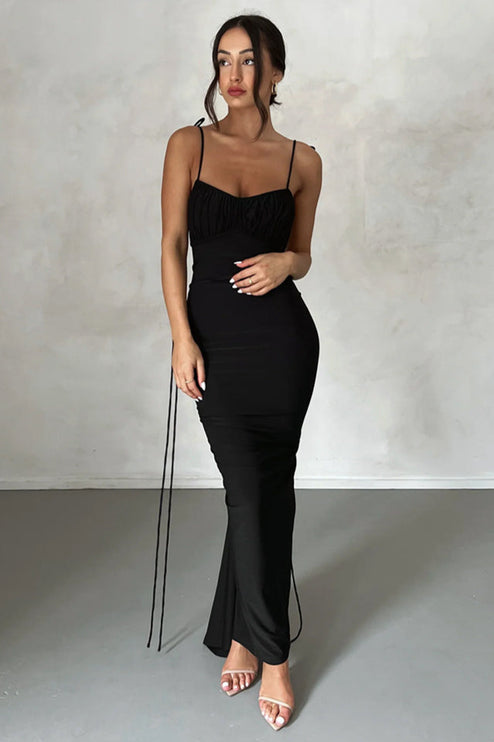 Front view of a women's black pleated plunge neck maxi dress with ruched bust and spaghetti straps