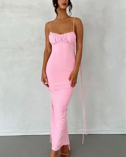 Front view of a women's pink pleated plunge neck maxi dress with ruched bust and side ruching details