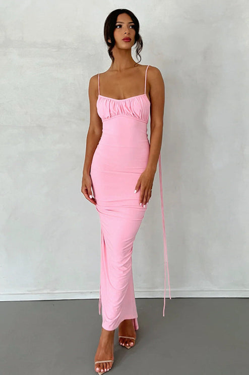 Front view of a women's pink pleated plunge neck maxi dress with ruched bust and side ruching details